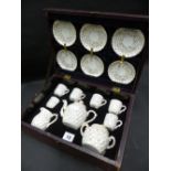 A CONTINENTAL BOXED PORCELAIN CHILD'S TEA SERVICE