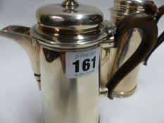 A SILVER CHOCOLATE POT AND A MATCHING HOT WATER POT. BIRMINGHAM 1945. APPROXIMATELY 20 OZS ALL IN