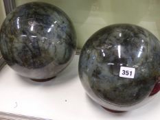 A VERY LARGE PAIR OF LABRADORITE STONE BALLS