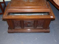 AN UNUSUAL LATE VICTORIAN CARVED WALNUT CELLARETTE / WINE BOX