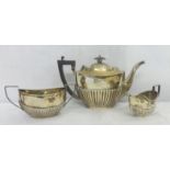 Early C20th Silver Queen Anne Style Tea Set: tea pot, two handled sugar & milk jug with ebonized