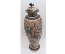 A CHINESE CRACKLE GLAZE COVERED BALUSTER VASE OF TAPERING FORM, PAINTED IN IRON RED AND FAMILLE