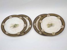 GROUP OF FOUR 20TH CENTURY JAPANESE SIDE PLATES, DECORATED WITH CENTRAL SCENES AND GILT BORDERS, 8