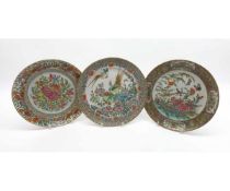 A COLLECTION OF THREE CHINESE CIRCULAR PLATES, CENTRES PAINTED WITH BUTTERFLIES AND FOLIAGE,