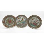 A COLLECTION OF THREE CHINESE CIRCULAR PLATES, CENTRES PAINTED WITH BUTTERFLIES AND FOLIAGE,