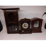 MIXED LOT: TWO EARLY 20TH CENTURY STAINED WOODEN MANTEL CLOCK CASES AND A FURTHER MID-20TH CENTURY