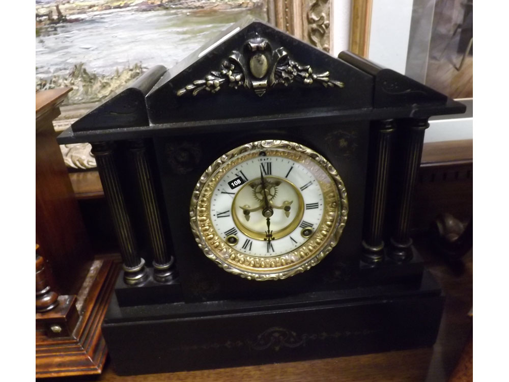 LATE 19TH OR EARLY 20TH CENTURY BLACK SLATE 8-DAY MANTEL CLOCK OF ARCHITECTURAL FORM, THE