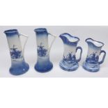 Mixed Lot: four Doulton Burslem jugs, decorated with blue and white patterns, two of cylindrical