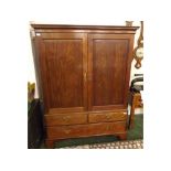 19th century mahogany linen press cabinet, the top section with two panelled doors, shelf