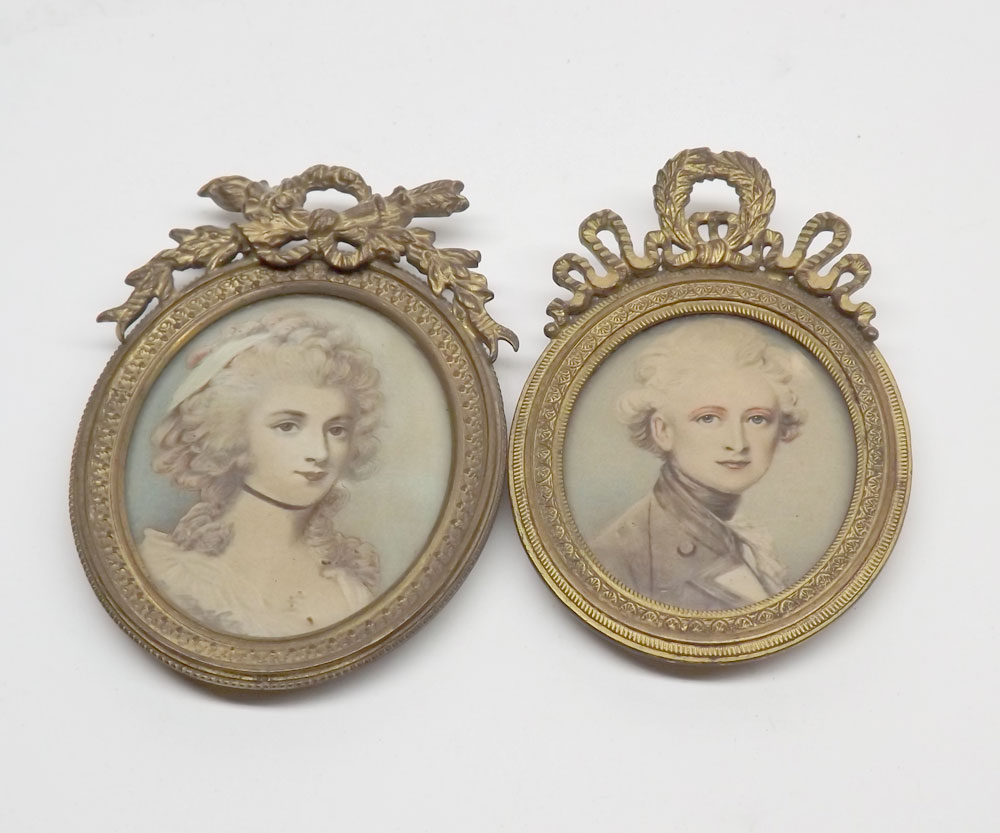 PAIR OF PHOTOGRAPHIC MINIATURES, FEMALE PORTRAITS IN BRASS RIBBONED FRAMED (2)