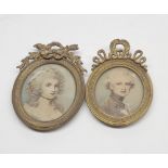 PAIR OF PHOTOGRAPHIC MINIATURES, FEMALE PORTRAITS IN BRASS RIBBONED FRAMED (2)