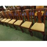 Set of six 20th century mahogany dining chairs with push out upholstered seats and front cabriole