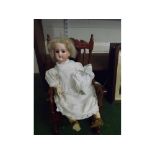 Antique porcelain headed doll, by Armand Marseille numbered 390 to back of head, together with an