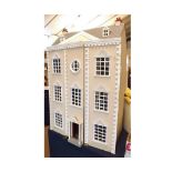 Late 20th century dolls house fashioned as a Georgian town house, twin opening front section to