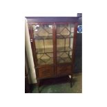 Edwardian mahogany china display cabinet, the astragal glazed top section over two cupboard doors