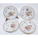 Four 20th century Berlin floral and gilt highlighted plates, 8 1/2" diameter