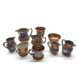 Mixed Lot: 19th century copper lustre wares to include five jugs, goblet, two mugs and a sugar