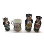 Graduated set of three 19th century Staffordshire toby jugs, modelled as portly gents in tricorn