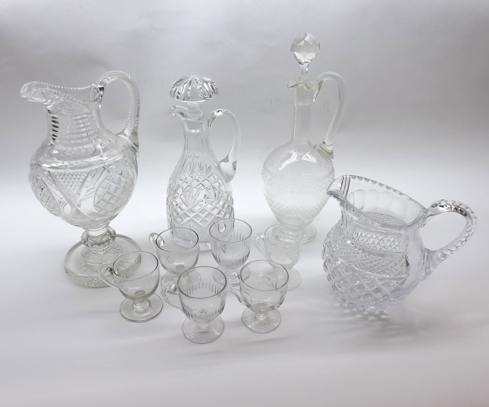 Mixed Lot: 19th and early 20th century cut clear glass wares comprising two jugs, two spirit