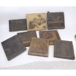 Collection of oriental wooden printing blocks decorated with various designs, birds, landscapes