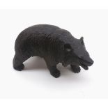 Small black forest type carved softwood model of a bear, 5" long