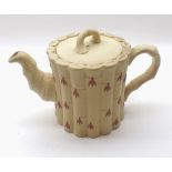 Wedgwood Queens ware cane ware teapot and cover, moulded p te-sur-p te and decorated in red with