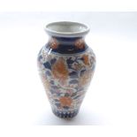 19th century Imari baluster vase, typically decorated with floral sprays and gilt highlights, 7 1/2"