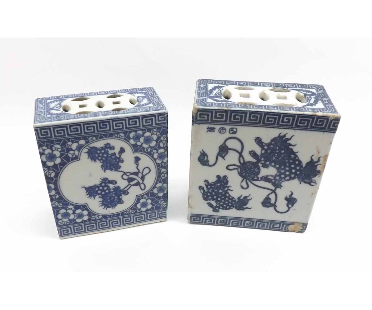 Two Chinese flower bricks, each of rectangular form with pierced tops, one decorated with kaolin