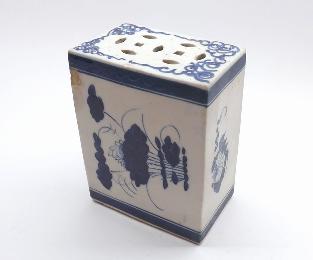 Chinese flower brick, of rectangular form with pierced top, body decorated with panel of foliage and