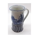 Unusual Doulton Burslem Norfolk pattern blue and white jug, of waisted form, fitted with looped