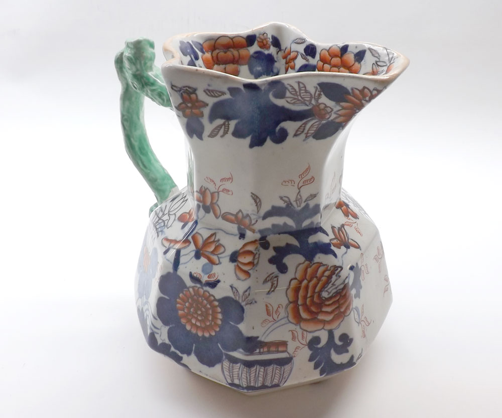 Masons Ironstone octagonal jug, typically decorated with blue and red floral sprays and a