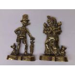 Pair of vintage brass door stops modelled as Punch and Judy, 10" high