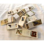 Box: nine cigarette card sets Player 1932 wild birds, 1932 butterflies (2 sets), 1933 aviary and