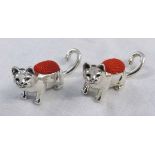 Mixed Lot: two various modern white metal pin cushions, each modelled in the form of a seated cat