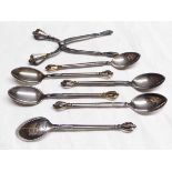 Mixed lot: a pair of Danish silver sprung sugar tongs together with six matching coffee spoons,