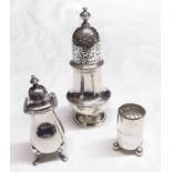 Mixed lot: three various pepper casters including a George III baluster example with pierced pull