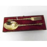 Continental Gilt Metal Presentation Spoon and Fork, with figure finials and twisted stems, approx 8"