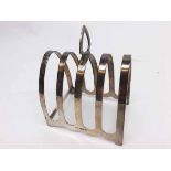 Edward VIII silver four-slice toast rack of arched form, fitted with looped handle, hallmarked