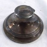George V Capstan inkwell of typical form with hinged cover and loaded base, diameter 3 1/2 ",