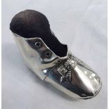 20th century American novelty pin cushion, modelled in the form of a child's shoe, with velvet inset