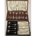 Mixed lot: a cased set of twelve coffee spoons together with a further cased set of six seal top