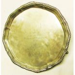 George V small salver of typical circular form with applied gadrooned border and polished field with