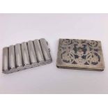 Mixed Lot: an early 20th century silver plated cigarette case of hinged, ribbed, rectangular form,