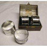 Mixed Lot: cased pair of George V napkin rings, of plain cylindrical form with engraved initials;