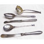 Mixed lot: a Victorian sifter ladle together with a beaded and initialled dessert spoon, modern