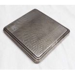 George V cigarette case of hinged rectangular form with all over engine turned decoration,