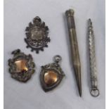 Mixed Lot: three various hallmarked silver chain fobs, two with gilt detail; together with a