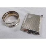 Mixed Lot: a silver napkin ring and a further matchbook cover, various dates and makers (2)