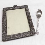 Mixed Lot: late Victorian silver mounted easel back photograph frame, the heavily embossed mount (