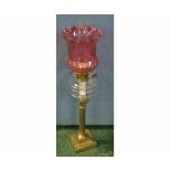 Victorian oil lamp, with clear glass chimney, cranberry tinted shade, clear glass font and